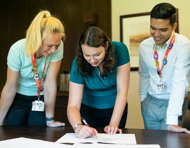 project managers discussing a communication plan