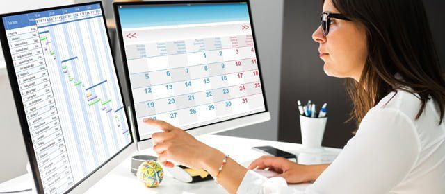 project manager updating project schedule